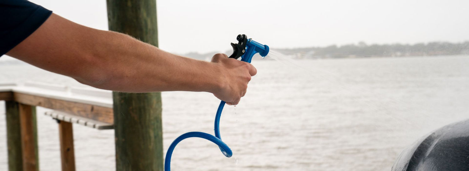 Washdown hose and nozzle for boat cleaning.