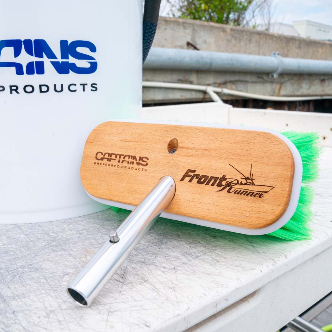 A custom engraved boat cleaning brush with a FrontRunner boats logo.