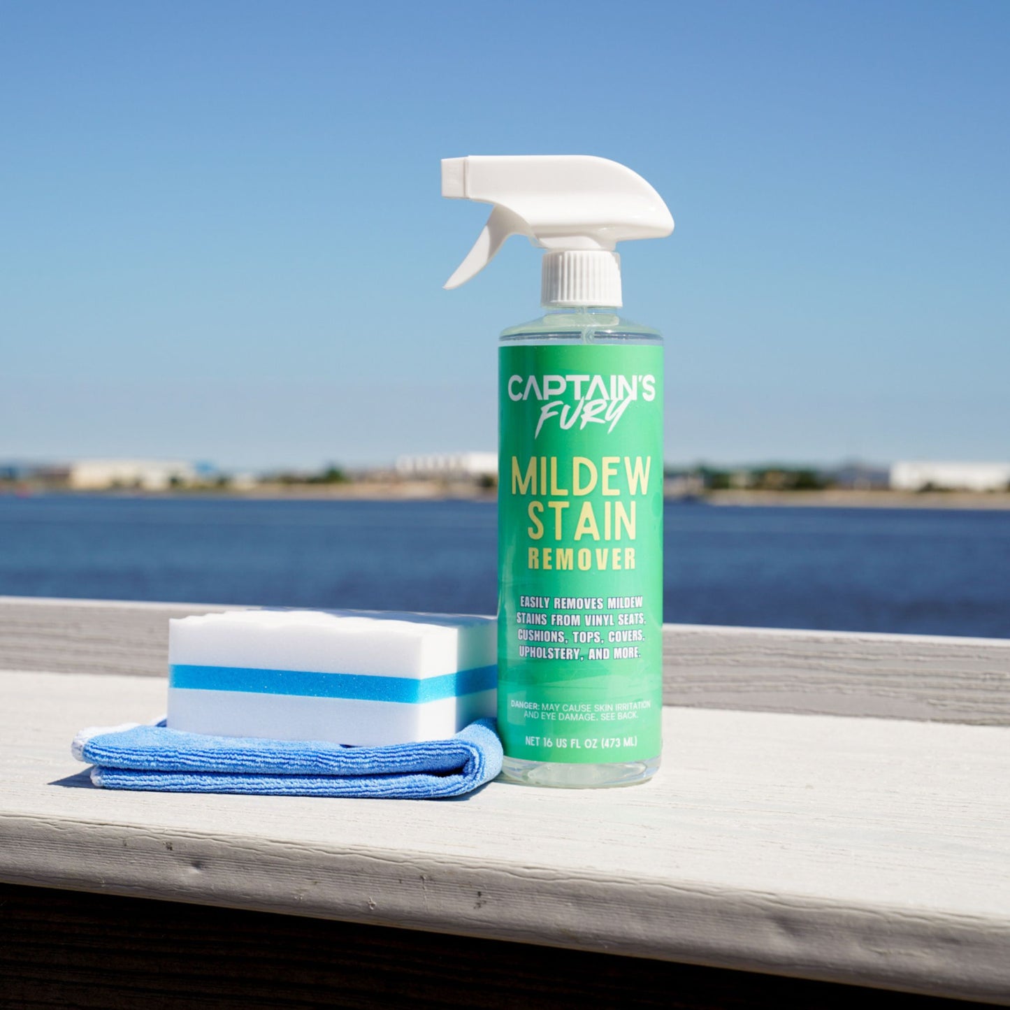 Marine mildew stain remover spray with sponge.