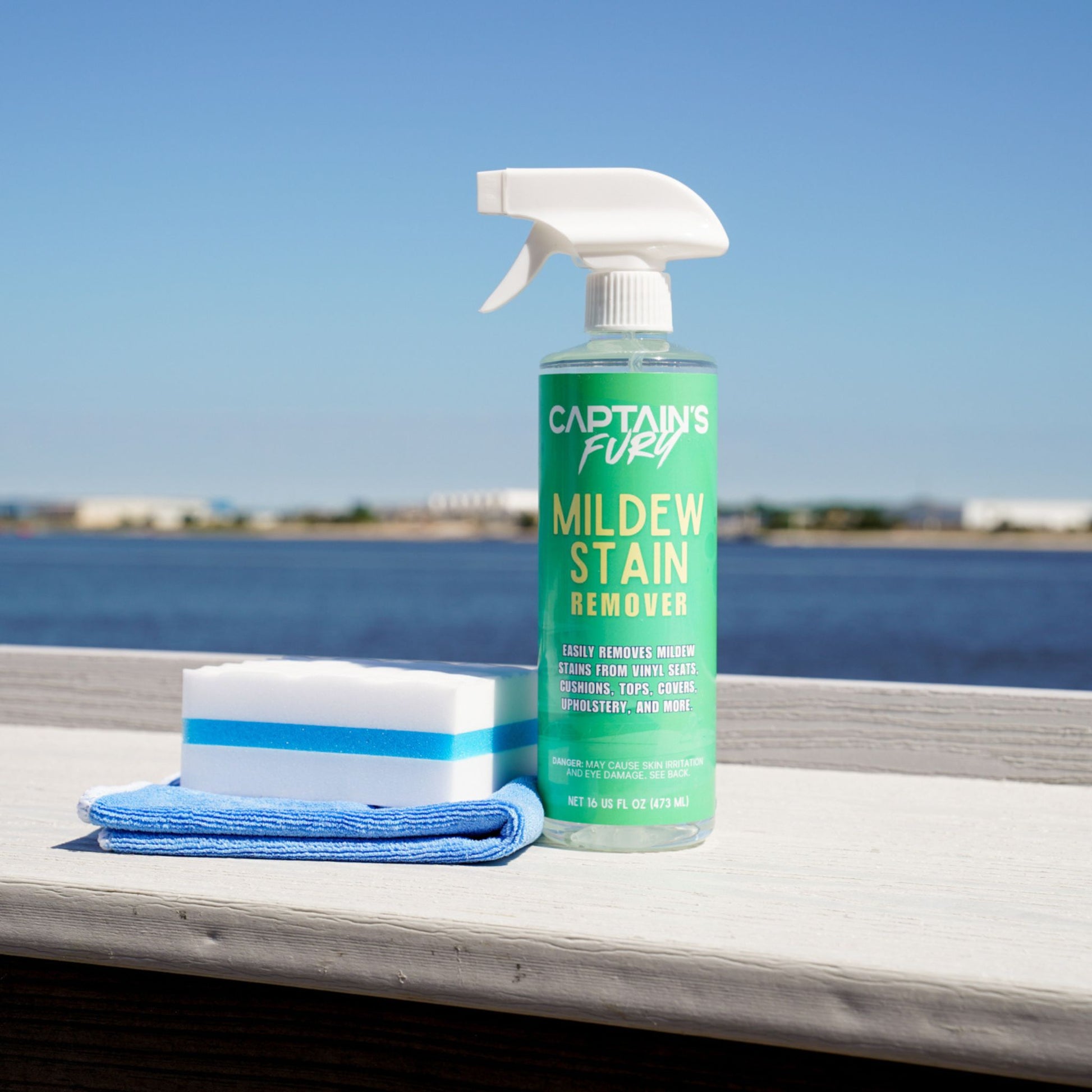 Marine mildew stain remover spray with sponge.