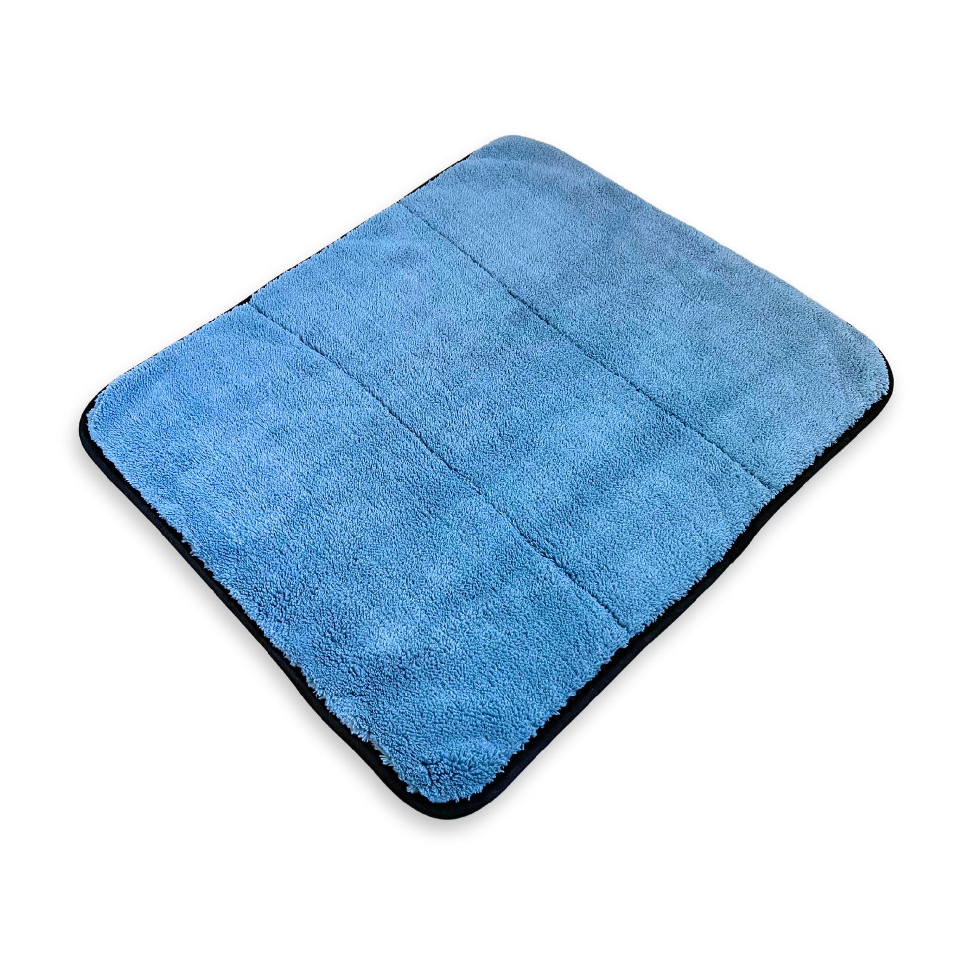 A 16" x 18" thick microfiber cleaning towel.