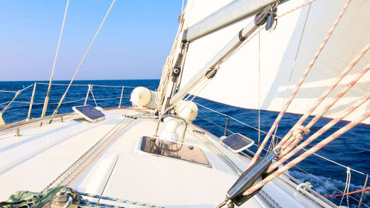 A heeling sailboat view from the boat deck.