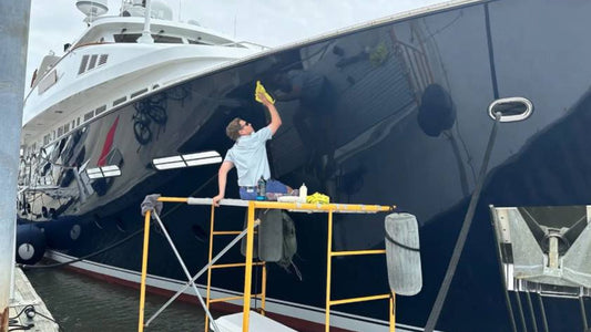 Using cutting compounds and polishing waxes on a boat.