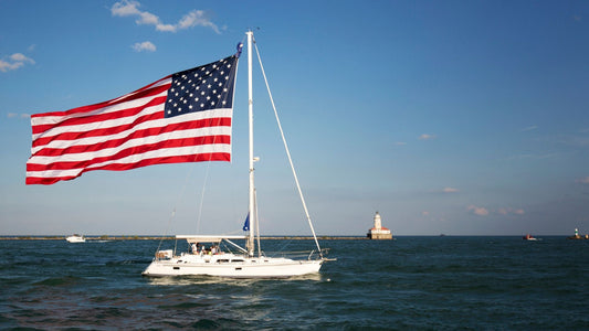 A boat with a large American flag on Lake Michigan.