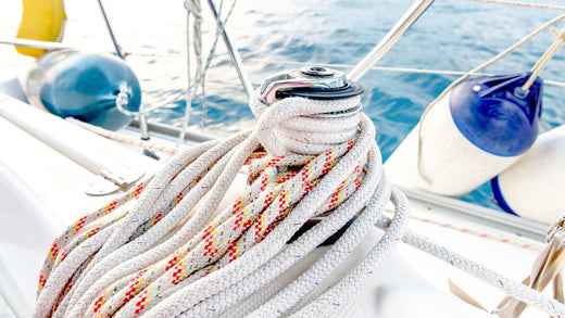 Ropes wrapped around a sailboat. 