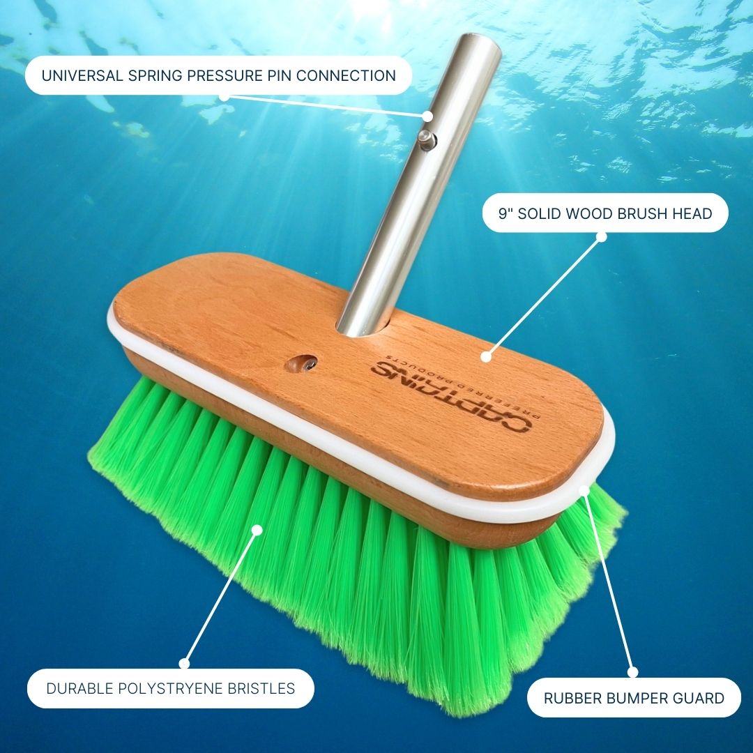 Features of a boat cleaning brush including bristles, head, bumper, and universal handle connection.