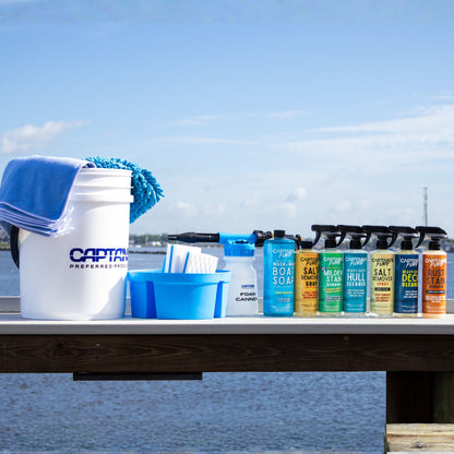 All 24 pieces of the Ultimate Boat Cleaning Kit set out on a boat dock.