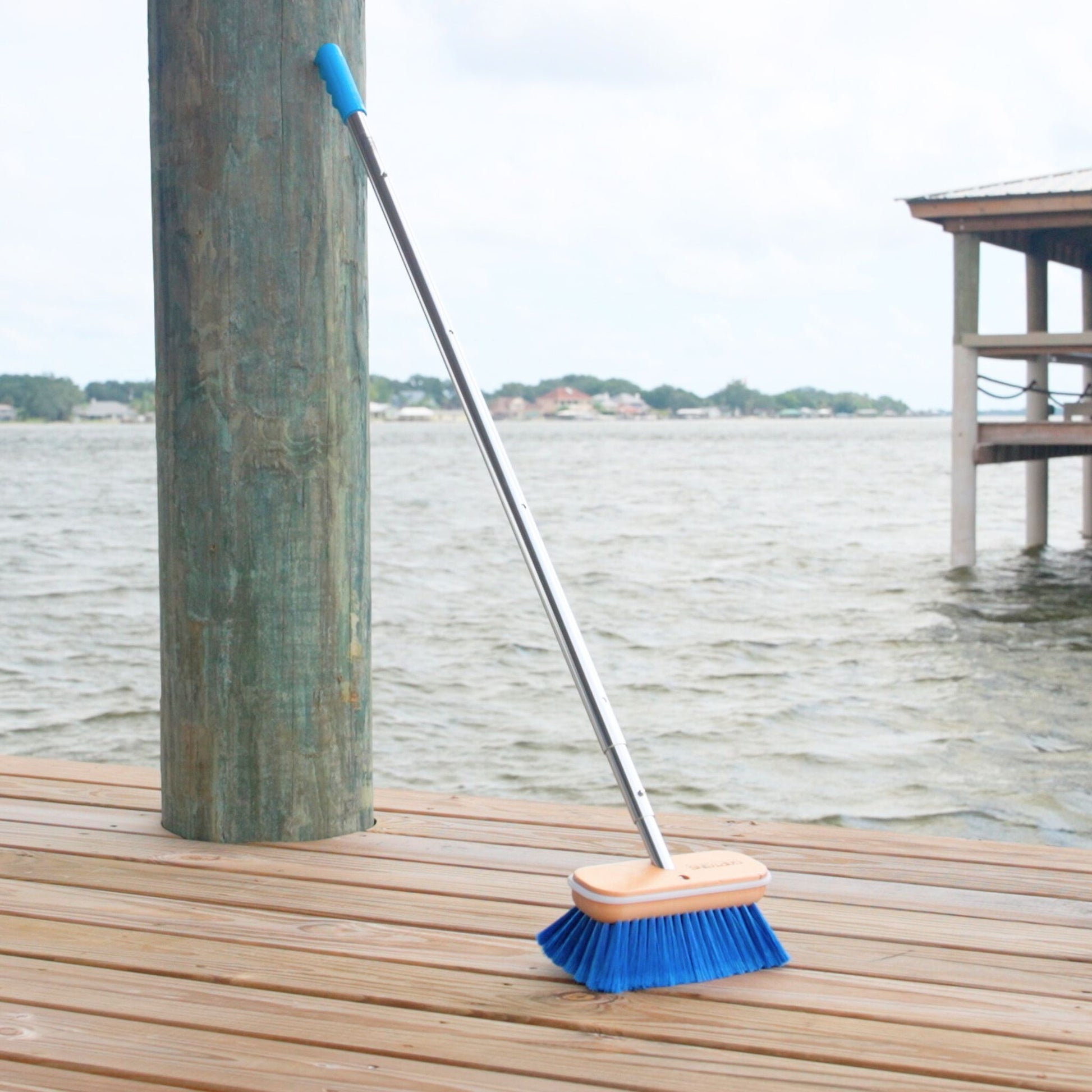 A blue boat brush head from Captains Preferred on a 6ft telescoping handle.