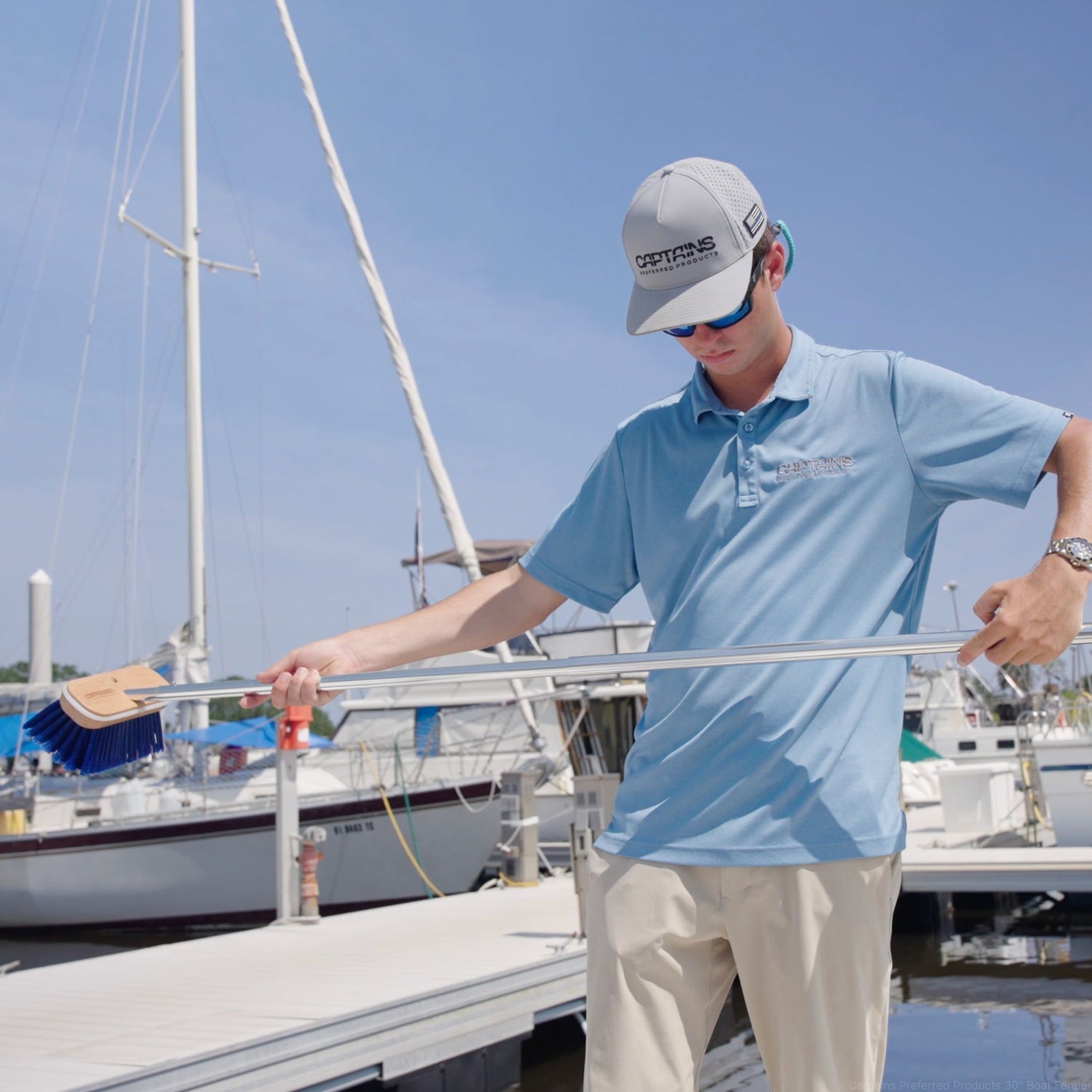 A boat brush with telescopic handle by Captains Preferred Products.
