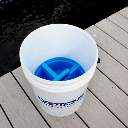 A blue bucket caddy inside of Captains Preferred Products' 5 gallon bucket with rope handle.