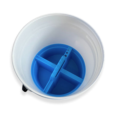 A blue bucket caddy inside of a 5-gallon bucket from Captains Preferred Products.