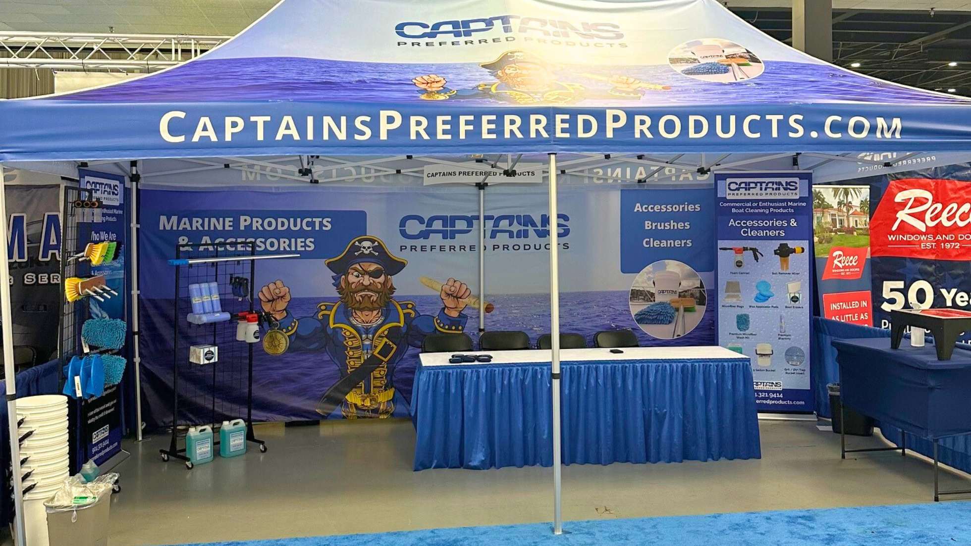 The Captains Preferred Products branded booth set up at a boat show event.