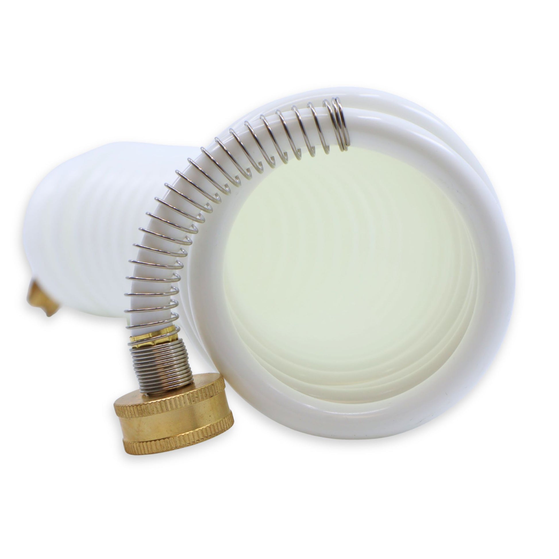 Female end brass connection on a white washdown hose.