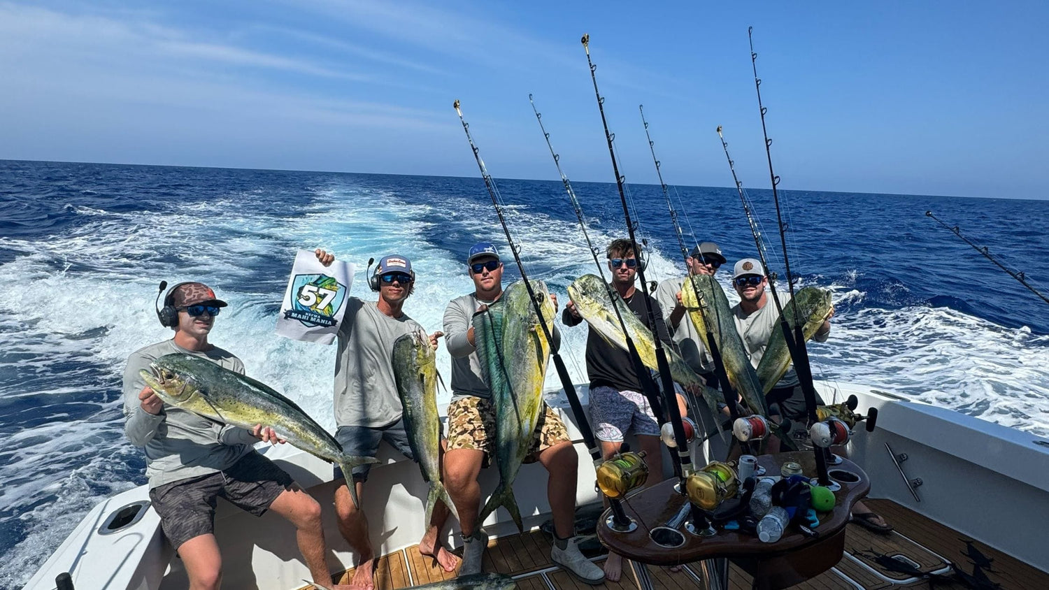 A mahi fishing team at NEFMA St. Augustine Mahi Mania fishing tournament displays their catch.