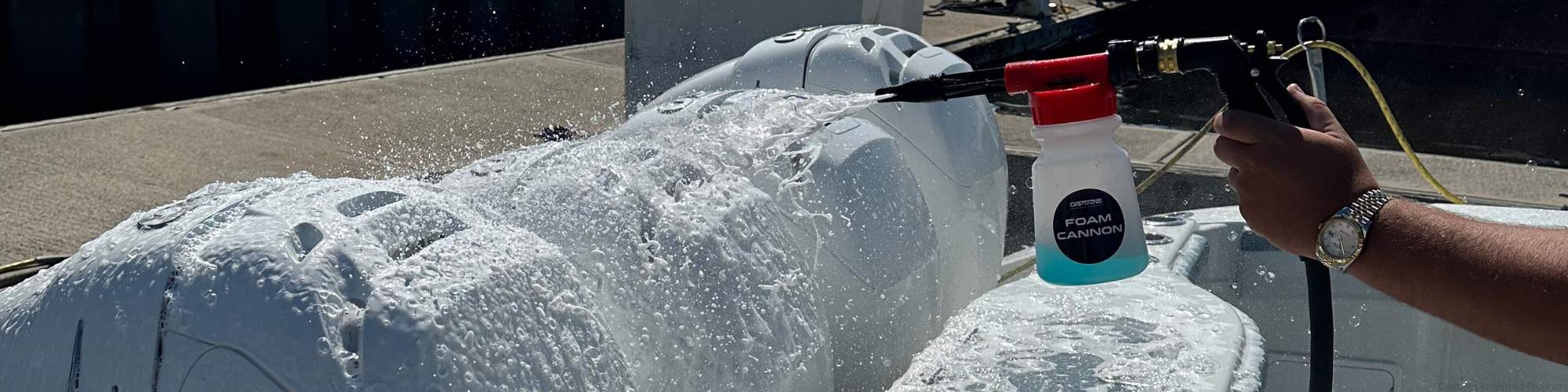 A foam cannon spraying lots of thick foam from the best foam cannon soap.