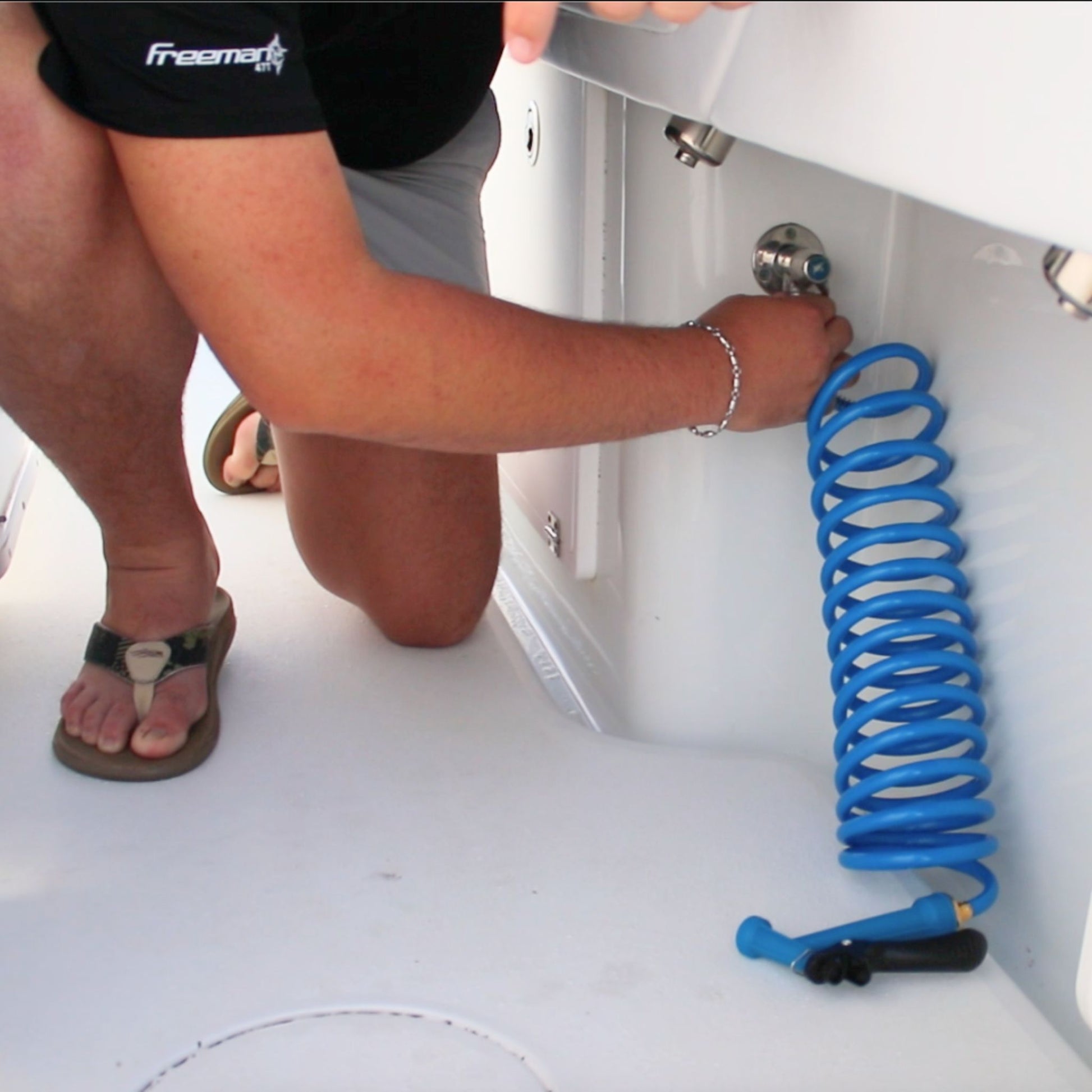Installing a Captains Preferred Products washdown hose on a boat.