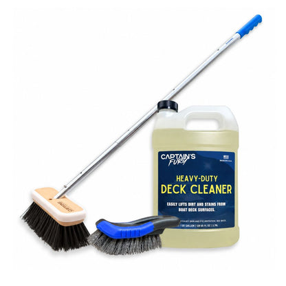 The deep scrub boat deck cleaning kit with a boat brush and handle, handheld scrub brush, and gallon of Heavy-Duty Deck Cleaner.