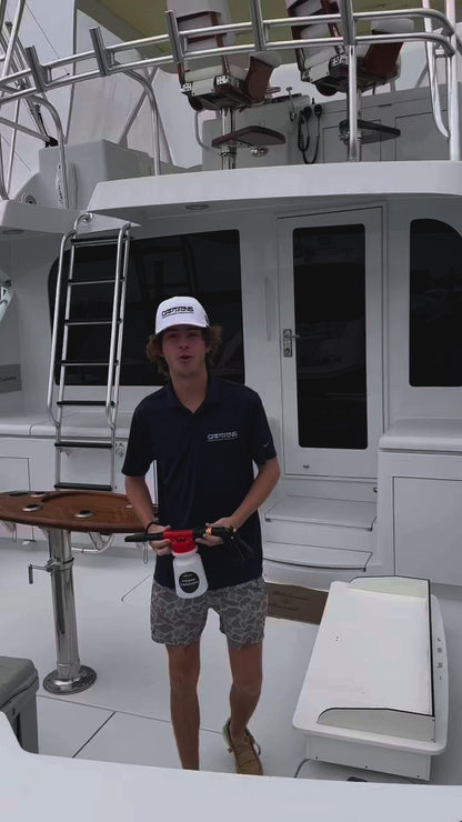 How to use a foam cannon with hose to clean a boat.