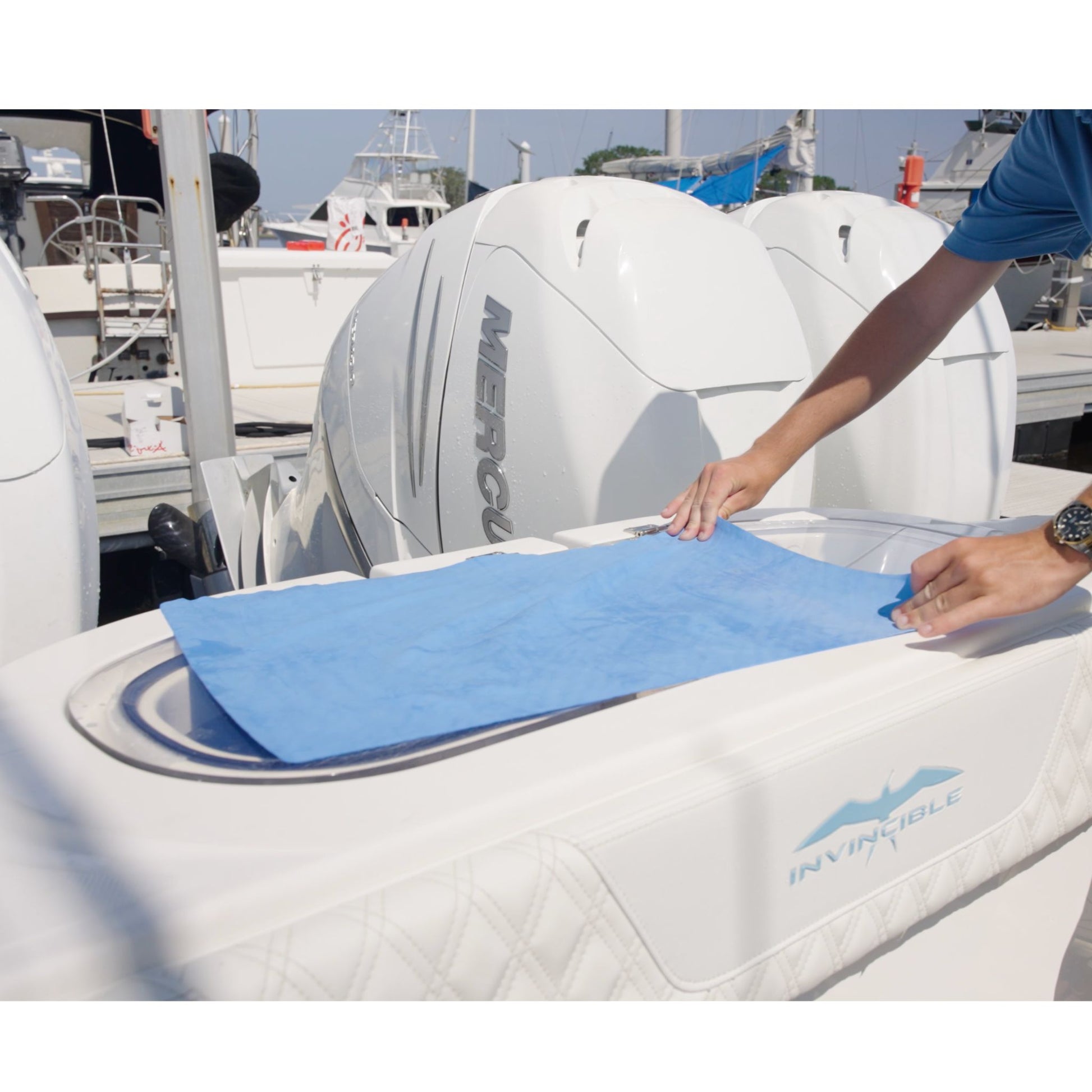 Captains shammy towel drying a boat transom.